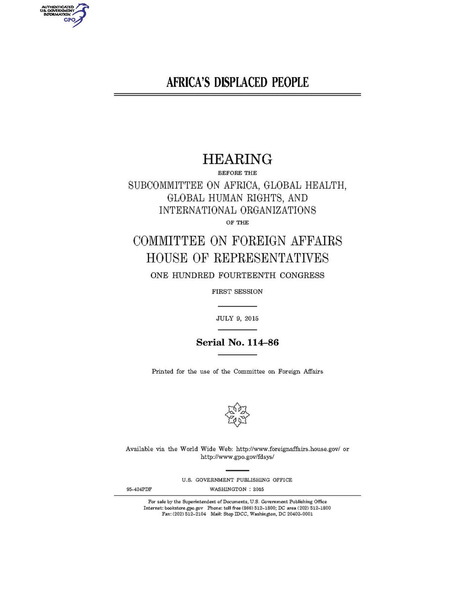 Displaced Sudanese families waiting near relief supplies at a camp